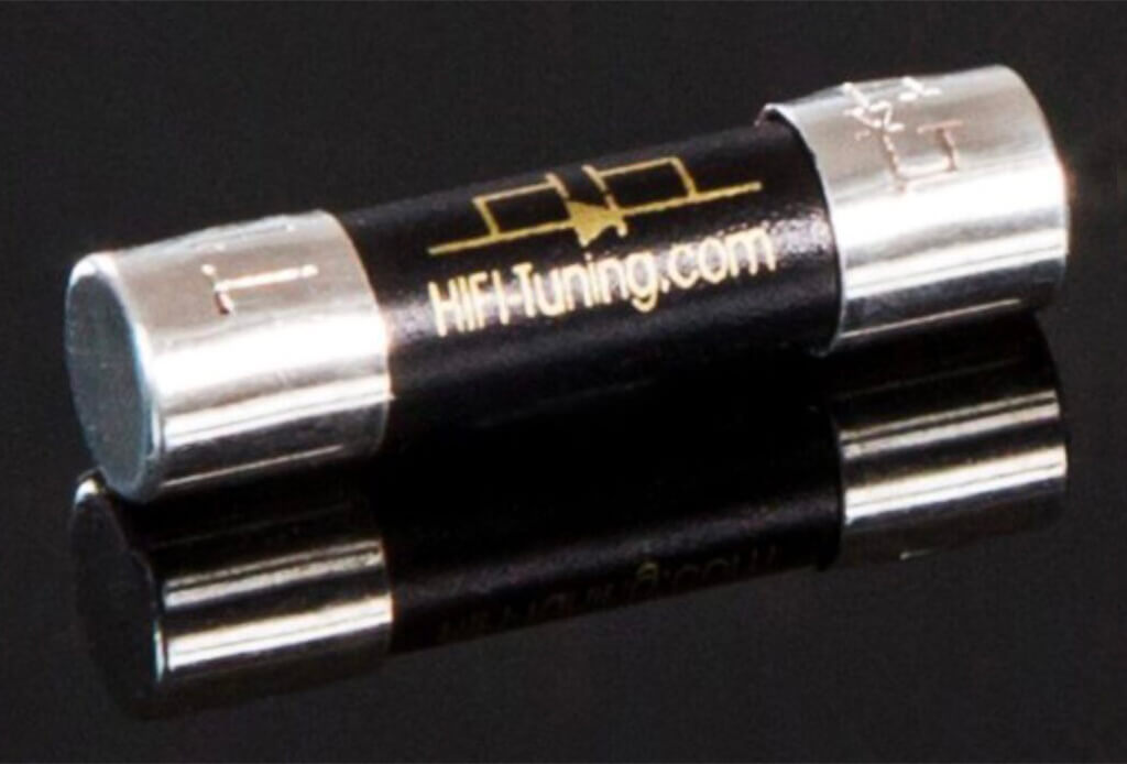 HiFi‑Tuning Supreme³ Silver/Gold fuse with 99% silver and 1% gold alloy end‑caps and filament inside a black ceramic tube, handmade in Germany for audiophile systems.